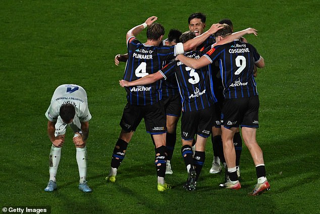 Auckland FC players celebrate after winning the 2025-26 A-League grand final
