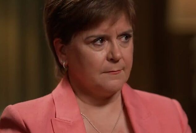Nicola Sturgeon came close to tears as she refused to apologise 'for the crimes of my former husband'