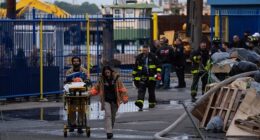 Fire crews were fighting a blaze inside an 150 sq ft metal structure which trapped at least two workers trapped when the explosion occurred on Friday afternoon