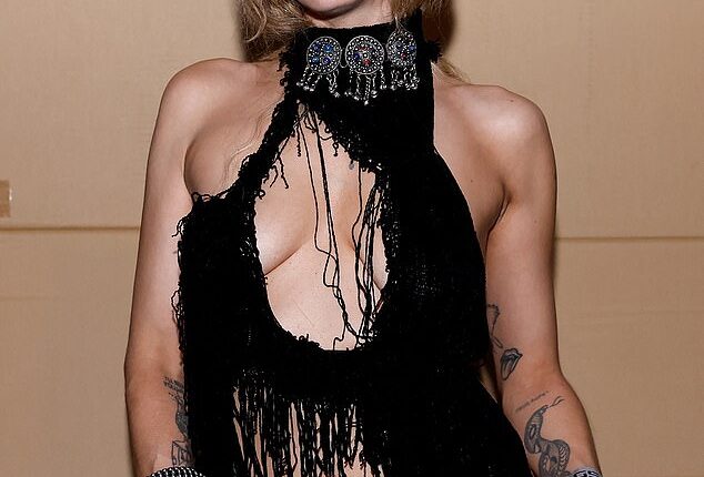 Imogen Anthony put on a brave face Wednesday night as she stepped out for a Sydney fashion event, showcasing her signature bold style despite her personal struggles