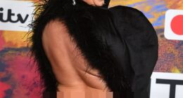 CMAT cheekily flashed her behind in a very low-cut black dress at the Brit Awards 2024 on Saturday night