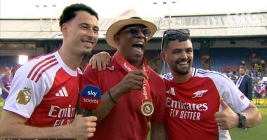 Ian Wright (middle) found himself in the thick of Arsenal's Premier League title celebrations