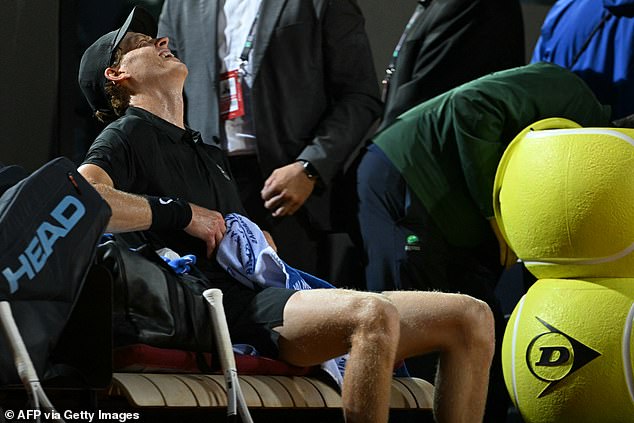 Jannik Sinner was seen grimacing in pain during his Italian Open semi-final in Rome