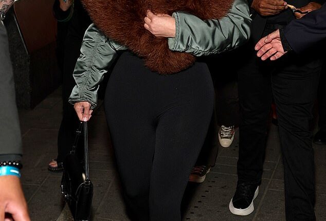 Kim Kardashian, 45, was roasted over her 'ridiculous' outfit that she wore to the star-studded Gucci 2027 Cruise Collection Show in New York City over the weekend