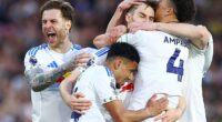 Leeds players celebrate with the scorer of their first goal, Anton Stach, at Elland Road