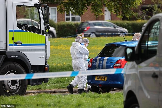 Forensic officers near a property in Bristol where an explosion killed a man and a woman on May 3, 2026