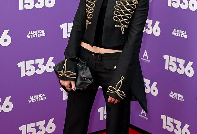 Margot Robbie turned heads in a black military-style jacket and low-rise jeans as she hit the red carpet at the 1536 West End opening night on Tuesday