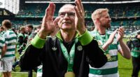 Martin O'Neill applauds the Celtic fans after their dramatic last day title win against Hearts