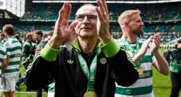 Martin O'Neill applauds the Celtic fans after their dramatic last day title win against Hearts