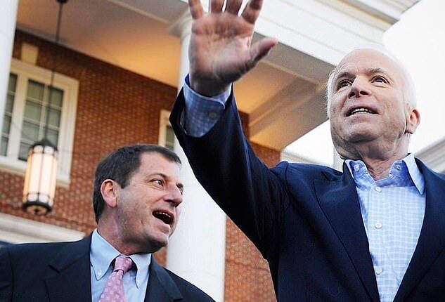 Doug is pictured with his senator father John McCain in a photo shared by the McCain Institute