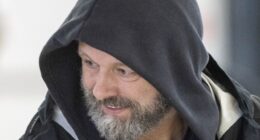 Michael Sheen appeared to already be pitching himself as a potential Traitor as he was pictured landing in Inverness wearing a hood for the second season of The Celebrity Traitors