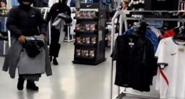 Hordes of hooded youths with balaclavas on Saturday raided a JD Sports store on the Ilford High Road of hangers of merchandise