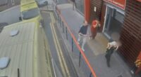 A paramedic carries a limp-looking Preston into hospital with Jamie Varley (pictured dressed in red) and John McGowan-Fazakerley close behind