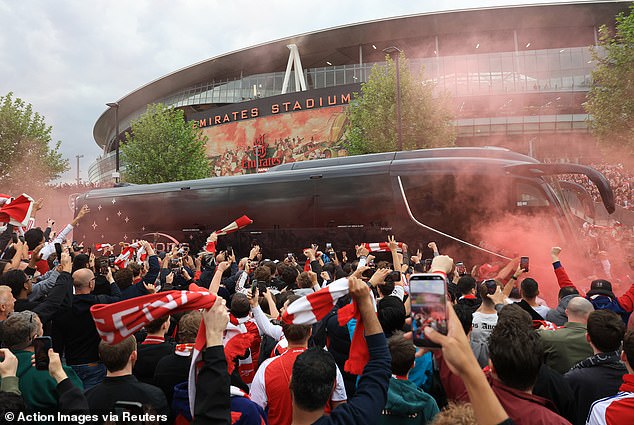 The tone for the raucous atmosphere at the Emirates before, during and after Arsenal's win over Atletico Madrid was set by a bus welcome organised by fan group REDaction Gooners