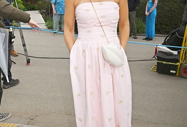 Pregnant Vogue Williams displayed her baby bump as she and Spencer Matthews led the celebrity charge at day one of the Chelsea Flower Show on Monday