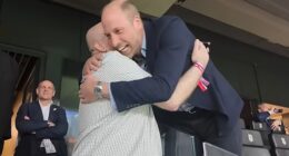 Prince William enthusiastically hugged a fellow Villa fan after the game had finished