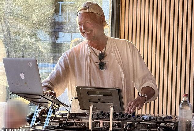 John Leslie as DJ Johnny Sunset, manning the decks at the Terrace Bar and Kitchen on the Algarve in Portugal