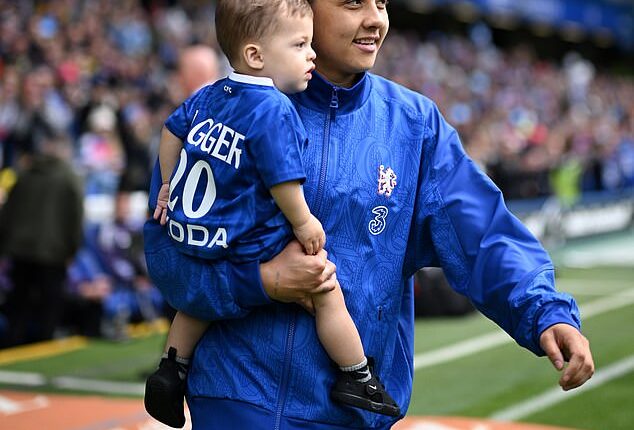 Sam Kerr brought her baby boy Jagger onto the field as she had a fairytale farewell in her last game with Chelsea (pictured)