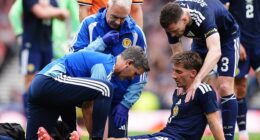 Billy Gilmour is attended to by Scotland medics but the look on his face told its own story