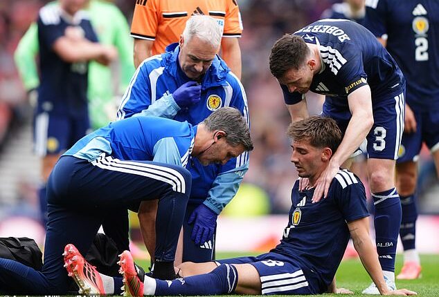 Billy Gilmour is attended to by Scotland medics but the look on his face told its own story