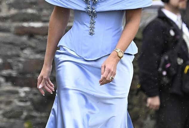 Paris Fury attended her daughter's nuptials in a stylish pale blue look, complete with a silk skirt and an off-the-shoulder top, cinched at the waist