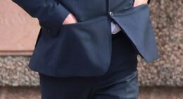 Hugh Fleetwood, 67, pictured leaving Liverpool Magistrates Court after being handed a suspended sentence for harassment and posting intimate pictures of his mistress online