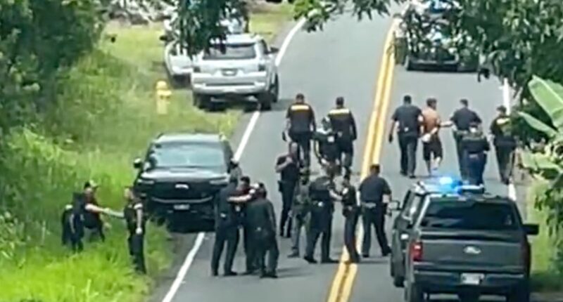 Suspect charged in killings of three people after Hawaii manhunt