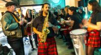 Glasgow band SambaYaBamba perform their World Cup song to an eclectic crowd in Partick