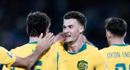 Football Australia will cut 20 per cent of its workforce (pictured, Socceroos star Adjin Hurstić celebrates during a match against Cameroon)
