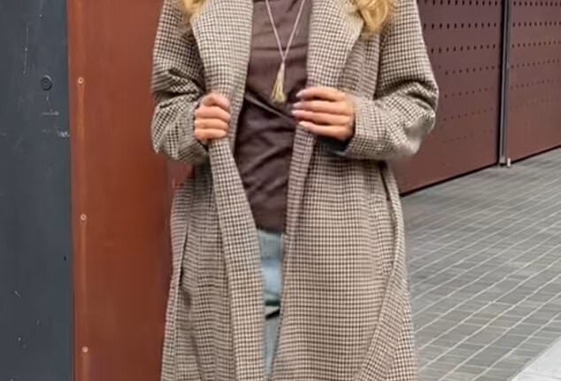 Fashion fans are scrambling to get their hands on Kmart's latest winter coat must-have, pictured