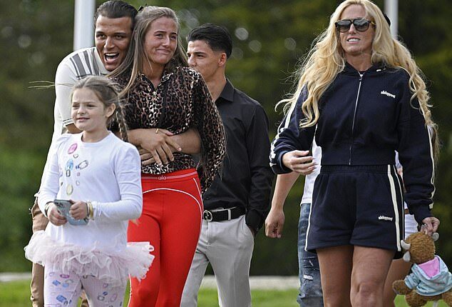 The wedding celebrations begin! Noah Price, 19, couldn't keep his hands off fiancée Venezuela Fury, 16, as the couple left their wedding venue after the church dress rehearsal on Friday