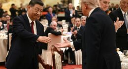 China's President Xi Jinping shakes hands with US President Donald Trump at a state banquet at the Great Hall of the People