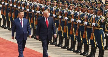 President Donald Trump participates in a welcome ceremony with China's President Xi Jinping at the Great Hall of the People, Thursday, May 14, 2026, in Beijing