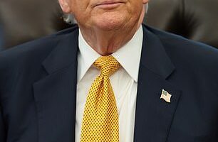 Donald Trump looks on during an event in the Oval Office of the White House on May 6