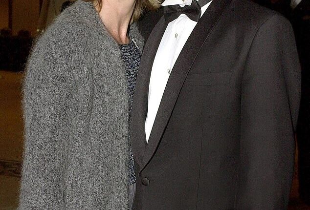 Olivia Newton-John believed her former boyfriend Patrick McDermott was either 'killed' or 'drowned' after he vanished off the coast of Los Angeles 21 years ago, a new biography has revealed. (Pictured together in 2001)