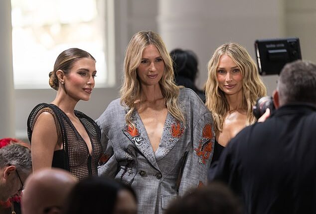 Australian Fashion Week officially took over Sydney this week, with the city's most stylish stars descending on the harbour for five days of runway shows, celebrity sightings and, naturally, some wildly questionable outfit choices. Pictured: Erin Holland, Nikki Phillips and Anna Heinrich