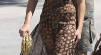 Harper Beckham wears a brown floral dress as she steps out for a family lunch in Ibiza