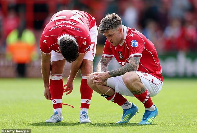Wrexham's Premier League dream has been put on hold after final day heartbreak