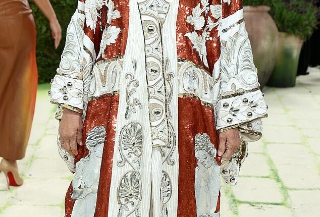Kris Jenner, 70, proved that her $100,000 facelift is not slipping as she looked very youthful at the 2026 Met Gala in New York City on Monday