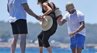 David and Victoria Beckham are holidaying with their son Romeo and daughter Harper on their £16million yacht. On Thursday, the former Spice Girl-turned-designer (pictured centre) impressed her fans after showing her commitment to fashion by teetering in heels on rocky terrain as she exited the yacht to join her family for a lunch in Formentera
