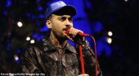Zayn Malik's comeback was hit by fresh drama on Thursday, as the star had water bottles thrown at him as he left a fan Q&A in London