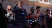 Donald Trump and his granddaughter Kai smirked as boos rang around MSG on Monday