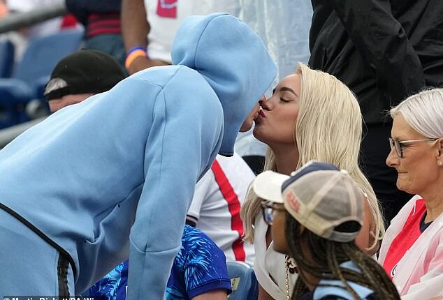 Jordan Pickford kisses his wife Megan after England's match last night