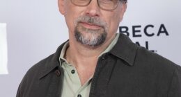 This 90s movie heartthrob looked unrecognizable with salt and pepper hair and a bushy beard as he attended the Tribeca Film Festival in New York City this week