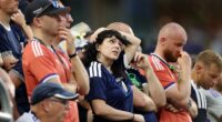 The glum Tartan Army look dejected after watching Scotland lose against Brazil