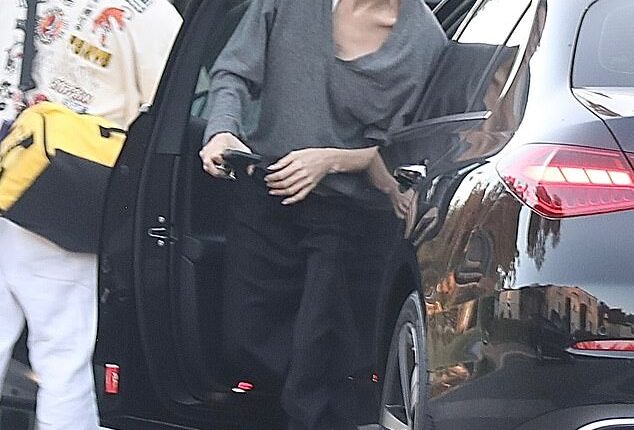 Angelina Jolie marked her 51st birthday with her children by her side on Thursday - after son Maddox became the latest of her brood to officially drop estranged dad Brad Pitt's surname - seen with son Knox, 17