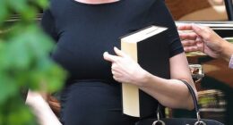 Anne Hathaway showed off her fashion-forward maternity style while working in New York City on Tuesday.