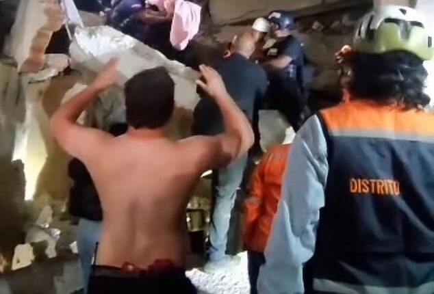 A newborn baby was pulled out alive from beneath the rubble of a collapsed building in Venezuela
