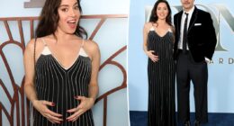 Aubrey Plaza cradles her baby bump while supporting partner Chris Abbott at Tony Awards 2026