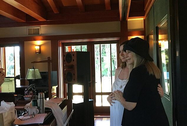 Barbra Streisand has shared a sweet snap cradling Anne Hathaway's growing baby bump after the actress announced she is expecting her third child